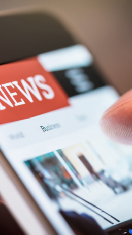 A phone screen showing a news app