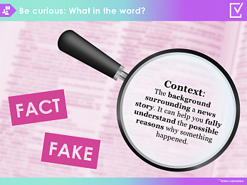 Magnifying glass over news headlines