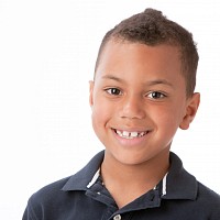 a young child smiling