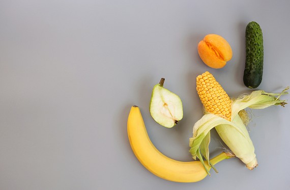 selection of fruit (banana, corn, gherkin) alluding to sex education