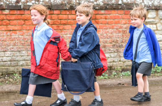 Children walking to school in uniform
