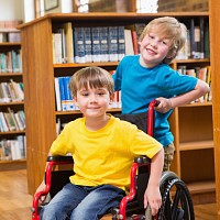 Two children in a library