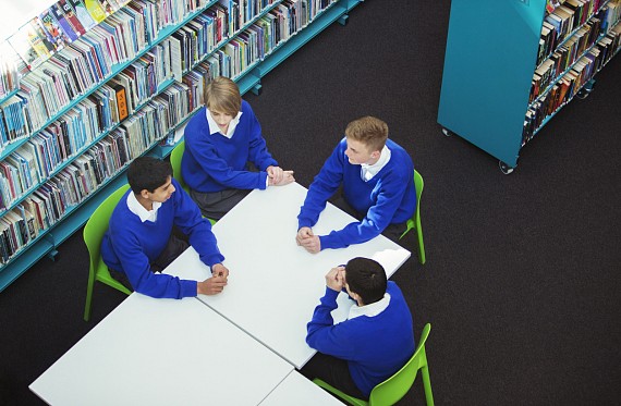 School councillors discussing what they'd like to change in school