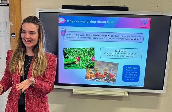 teacher presenting a VotesforSchools lesson