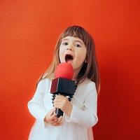 child with microphone