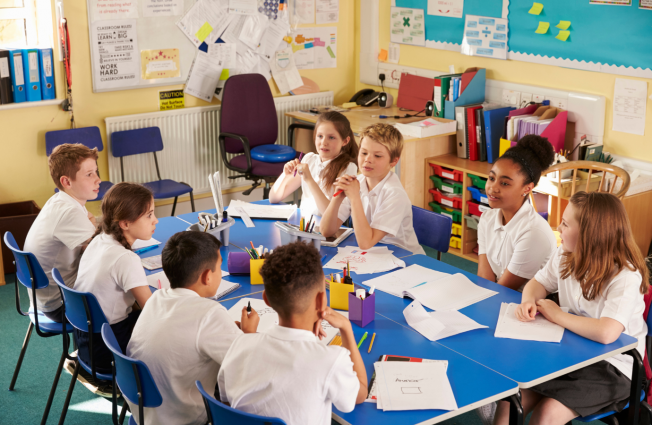 children talking in school